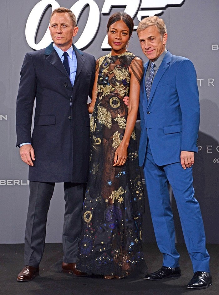 Daniel Craig, Naomie Harris and Christoph Waltz pose for photos at the "Spectre" premiere