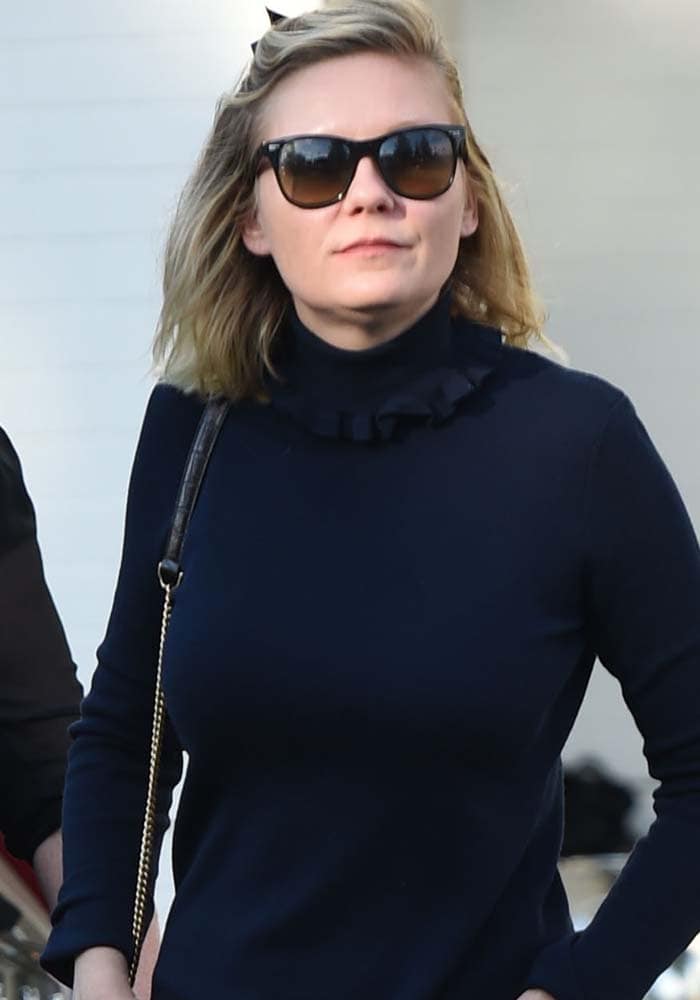 Kirsten Dunst wore a black turtleneck top