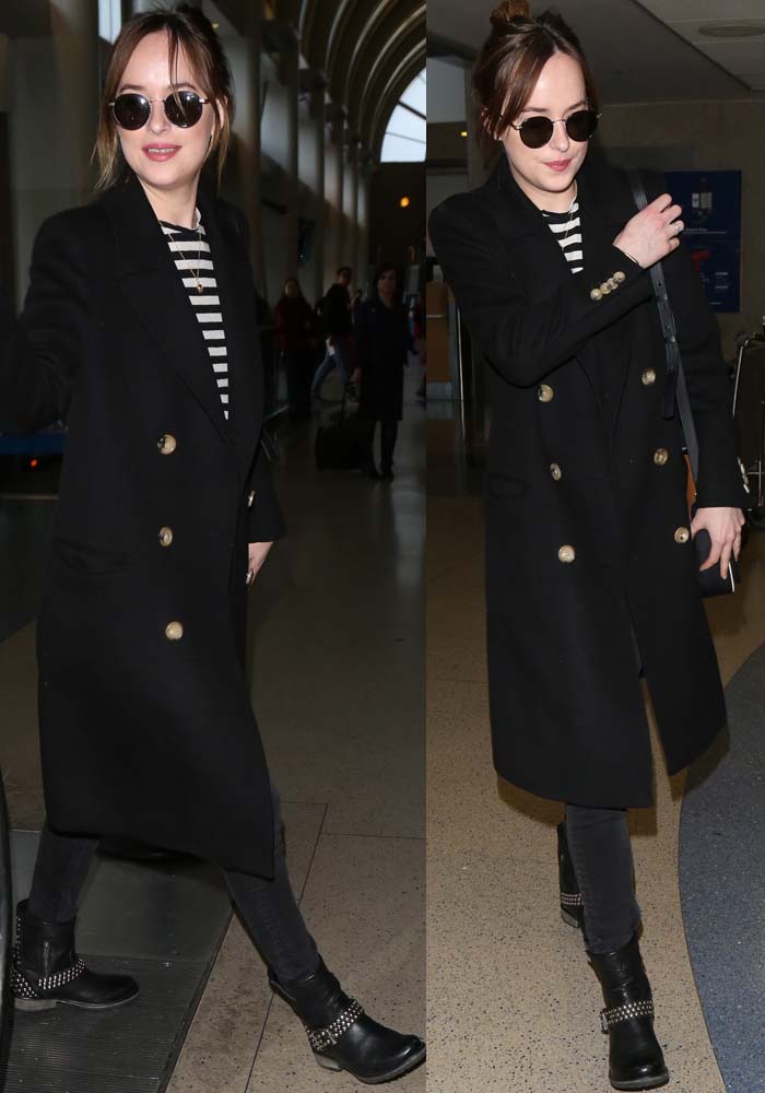 Dakota Johnson in a striped tee by Alexander Wang and a long Gucci coat