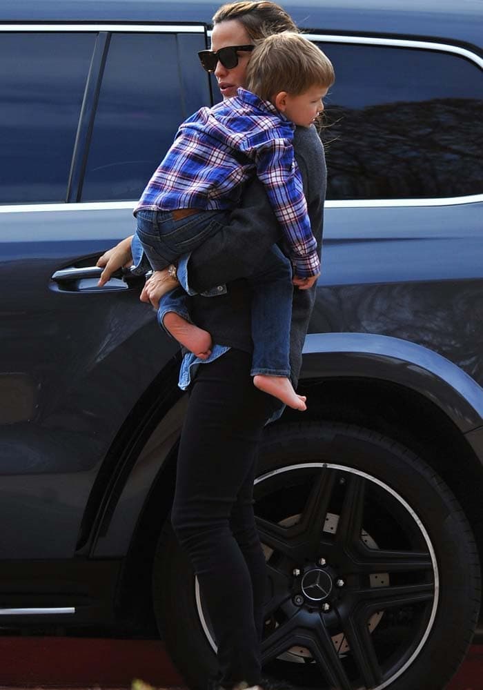 Jennifer Garner carries her son Samuel to the car after a playdate