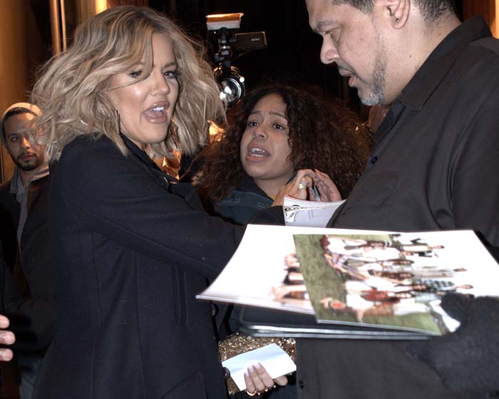 Khloe Kardashian interacts with fans at a signing of her new book