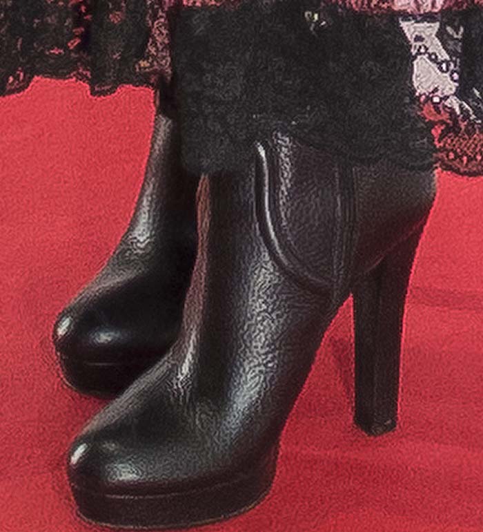 Penelope Cruz wears a pair of platform ankle boots on the red carpet