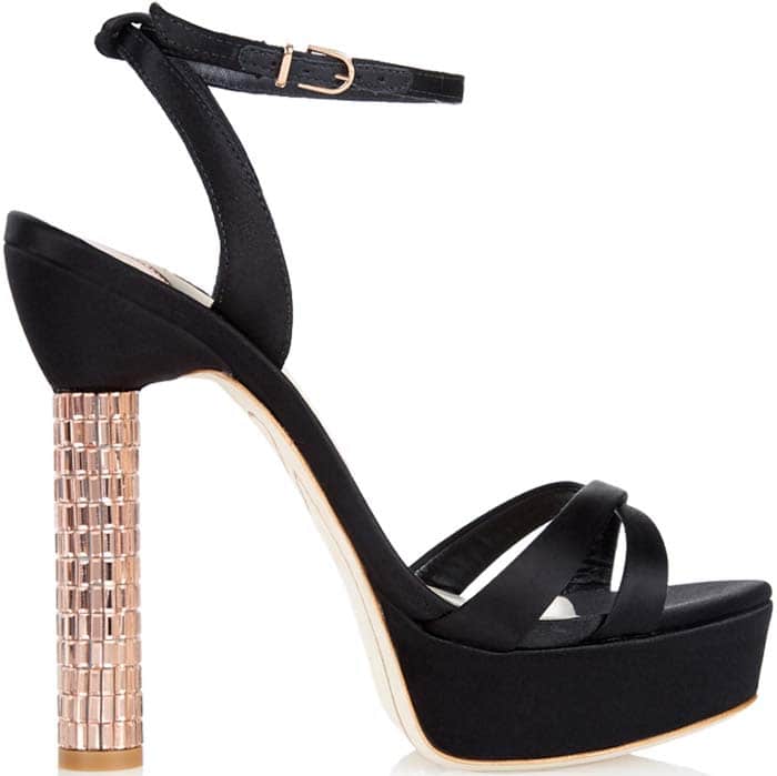 Detailed with an open toe and crossover front strap, this black pair is an easy way to make a style statement