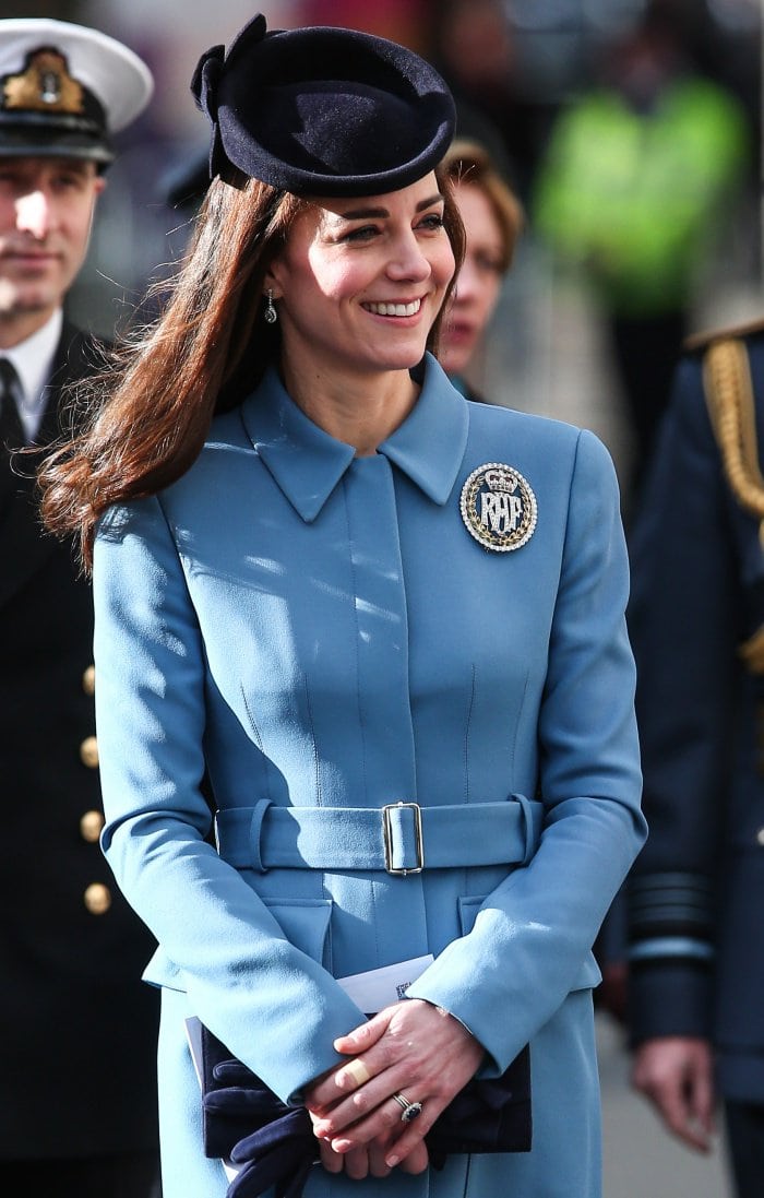 Kate Middleton accessorizes her blue Alexander McQueen coat with a diamond Dacre brooch