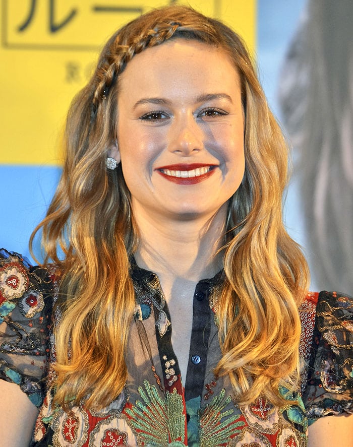 Brie Larson wore her hair down in loose waves with a chic braided headband