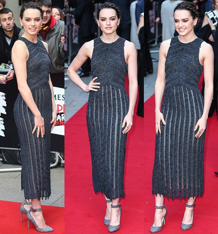 Daisy Ridley poses on the red carpet in a Boss dress