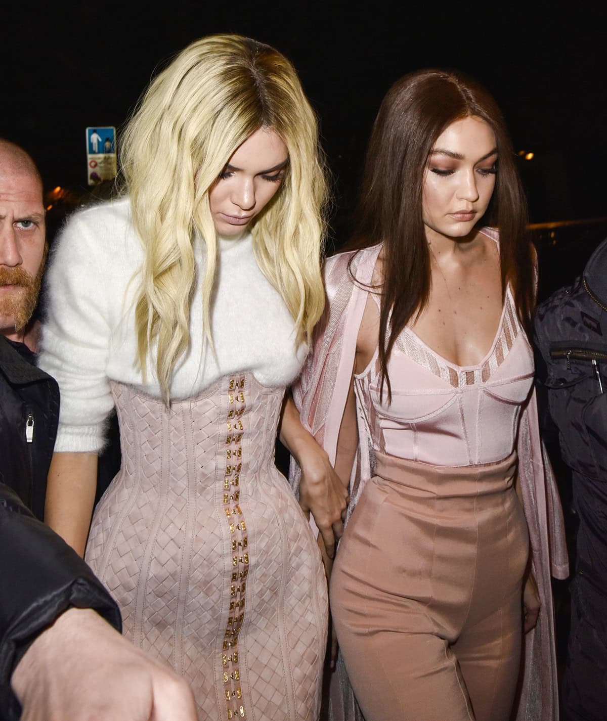 Kendall Jenner and Gigi Hadid turn heads with swapped hair colors and coordinated blush-toned Balmain outfits, perfectly blending elegance and bold style