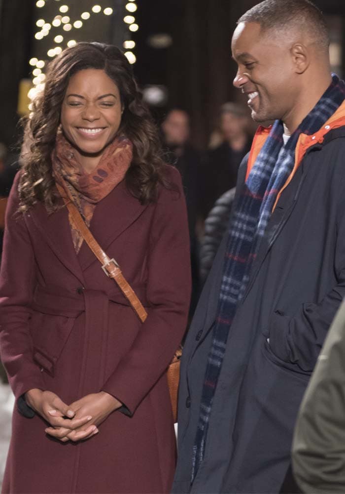 Naomie Harris and co-star Will Smith laugh on the set of "Collateral Beauty"