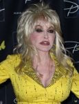 How Dolly Parton’s Boobs and Plastic Surgery Impacted Her Career