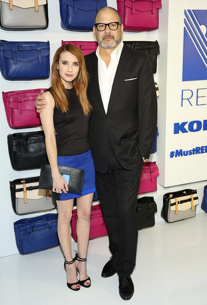 Emma Roberts and designer Reed Krakoff pose for photos at the REED x Kohl's Collection Launch dinner