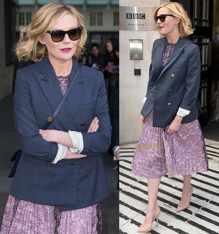 Kirsten Dunst pairs a Gucci dress with a dark blue blazer