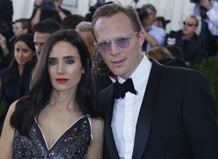 Jennifer Connelly and her husband Paul Bettany pose for photos at the Met Gala