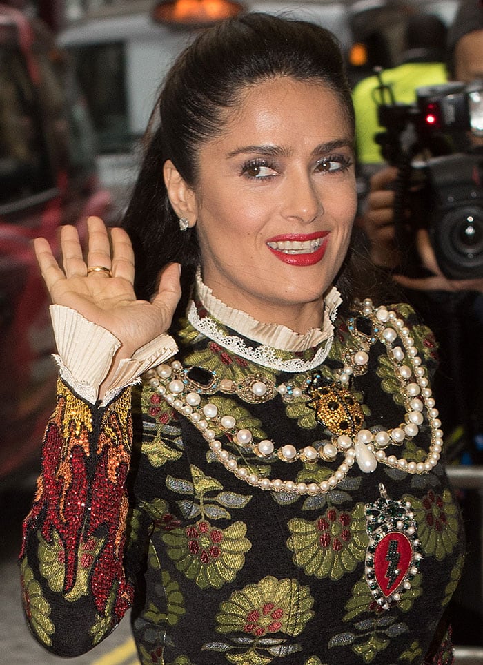Salma Hayek with subtle smoky eyeshadow and a slick of bright red lipstick