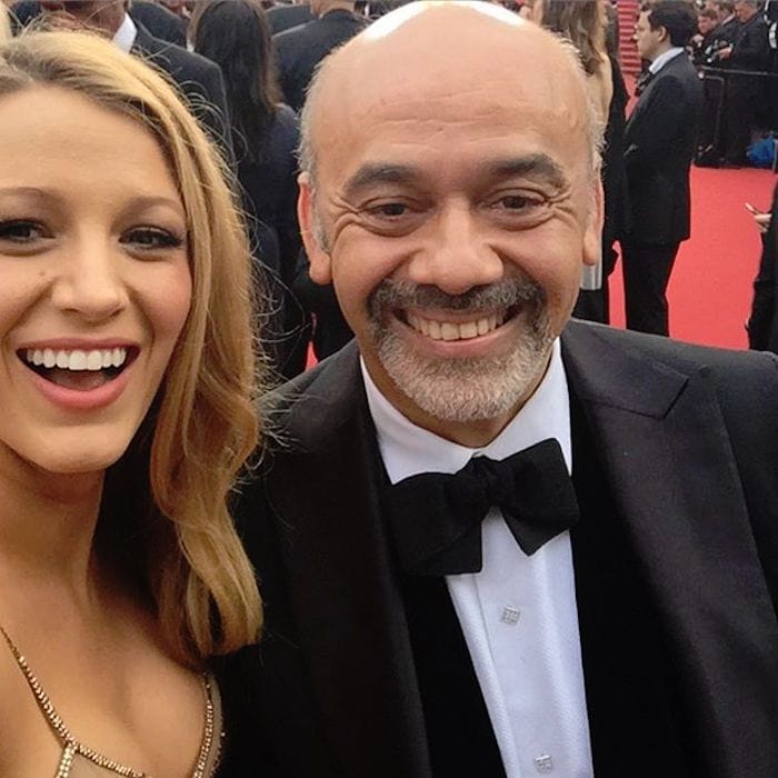 Blake Lively posted a photo with her date, footwear designer Christian Louboutin, and then posted a selfie with him at the Cannes premiere of Cafe Society on May 11, 2016