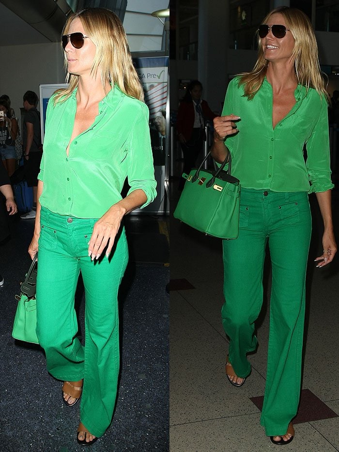 Heidi Klum wearing an all-green outfit at the Los Angeles International Airport (LAX)