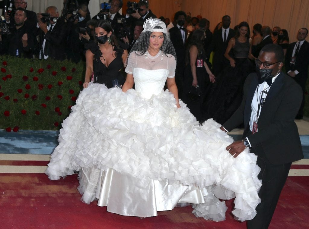 Kylie Jenner Wears Virgil Abloh Wedding Dress With Backwards Ball Cap