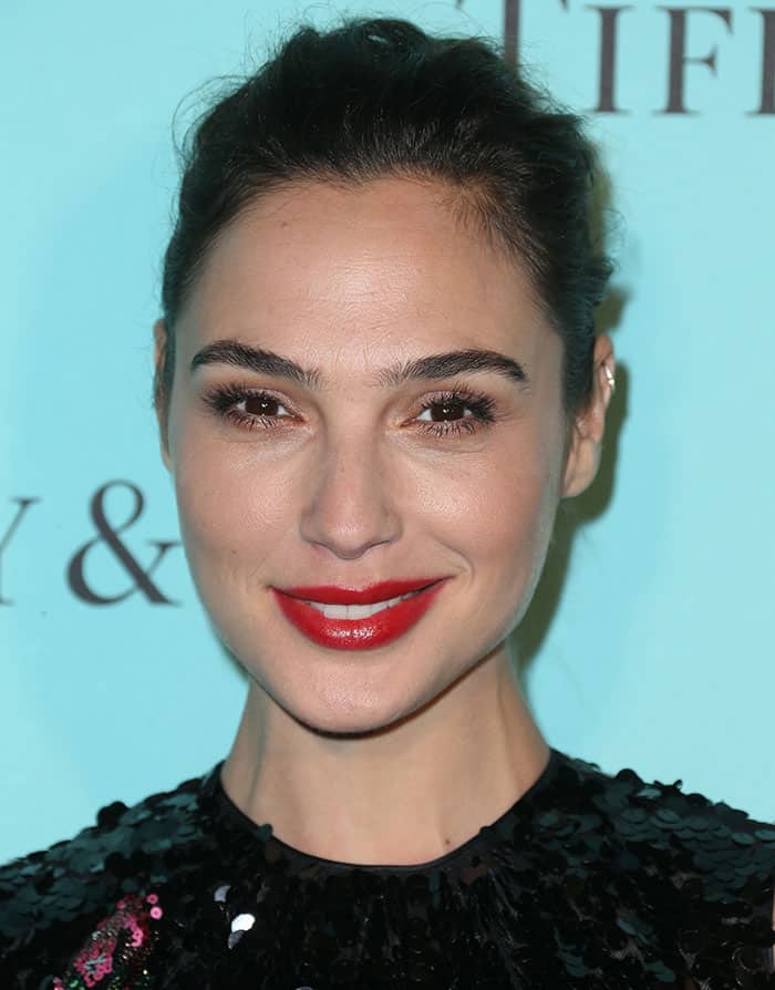 Gal Gadot is famous for her bright red lips and smoldering brown eyes