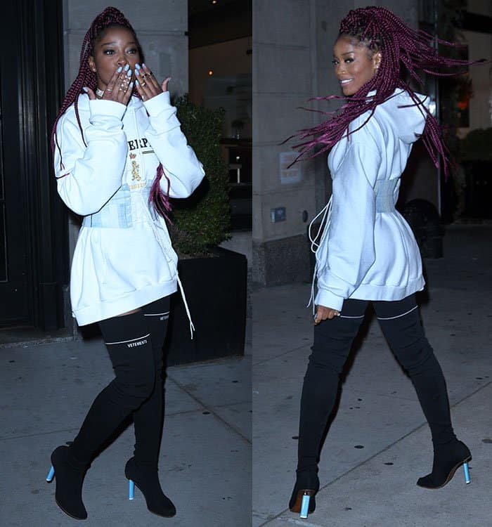 Keke Palmer strikes a fun pose, covering her face with playful hands in one shot and confidently flipping her magenta braids in the other, exuding carefree energy and style