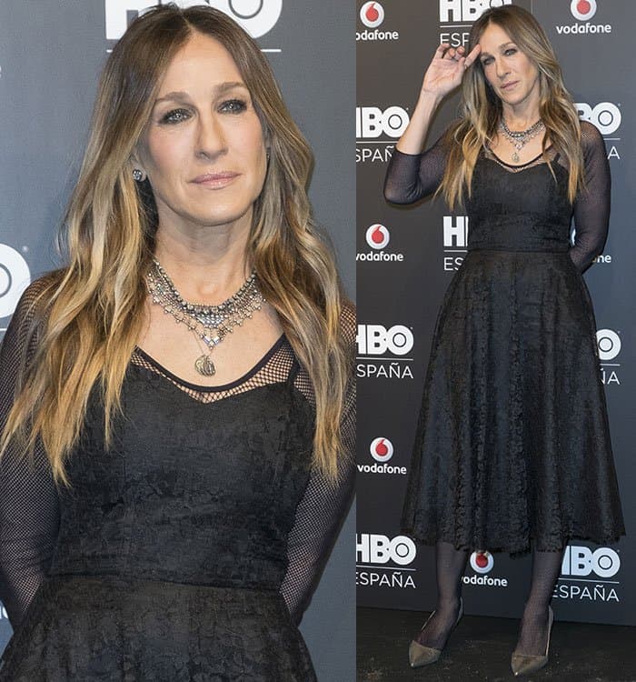 Sarah Jessica Parker casually adjusts her hair at the HBO España launch party in Madrid