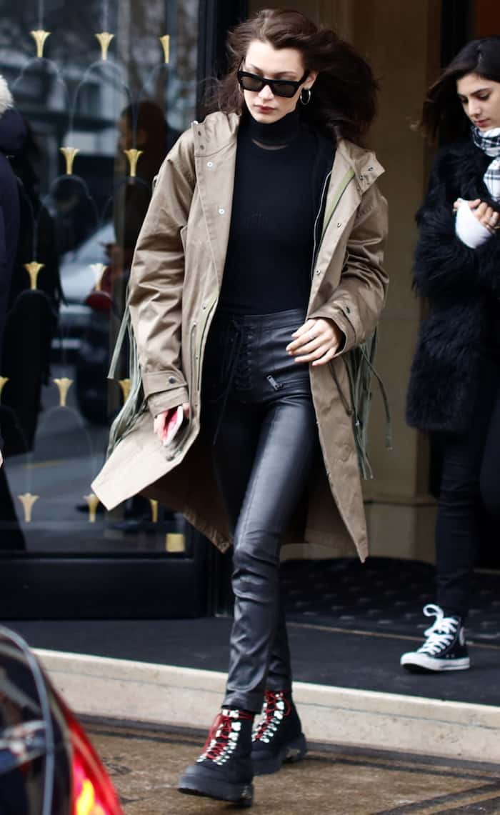 Bella Hadid in Fringed Trench Coat and Off-White Hiker Boots