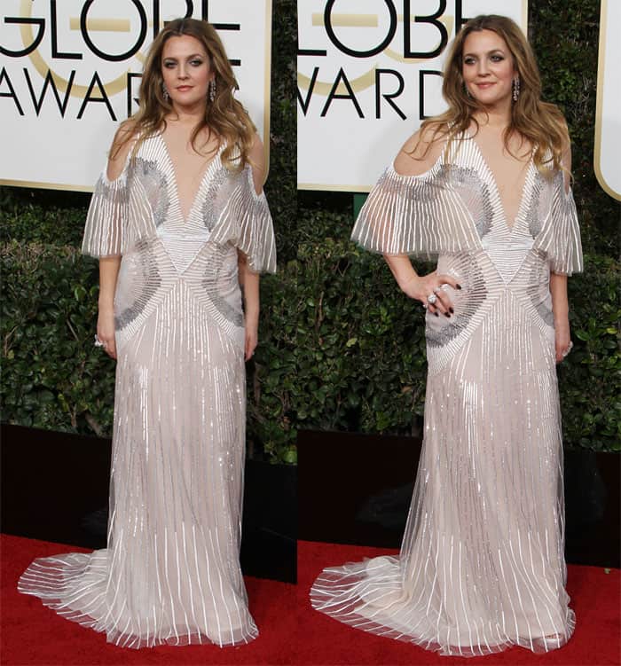 Drew Barrymore embraces her bohemian side in a Monique Lhuillier gown with flowing wing-like sleeves