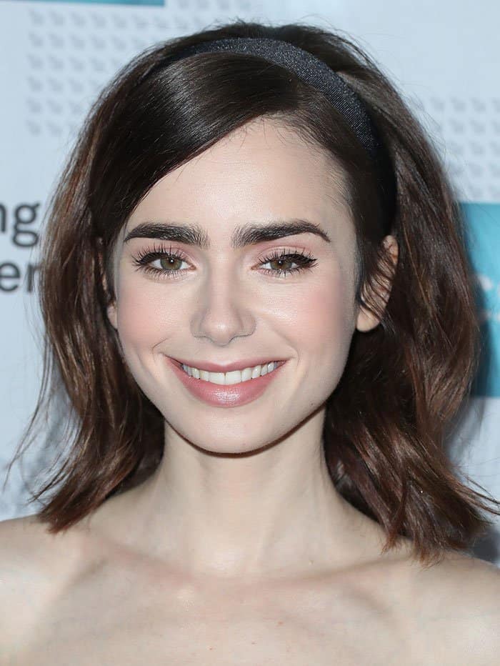 Lily Collins Shows Skin in Jimmy Choo Pumps at Artios Awards