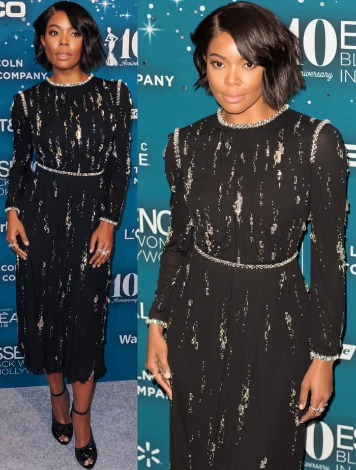 Gabrielle Union wearing a Prada embellished dress and black ankle-strap heels
