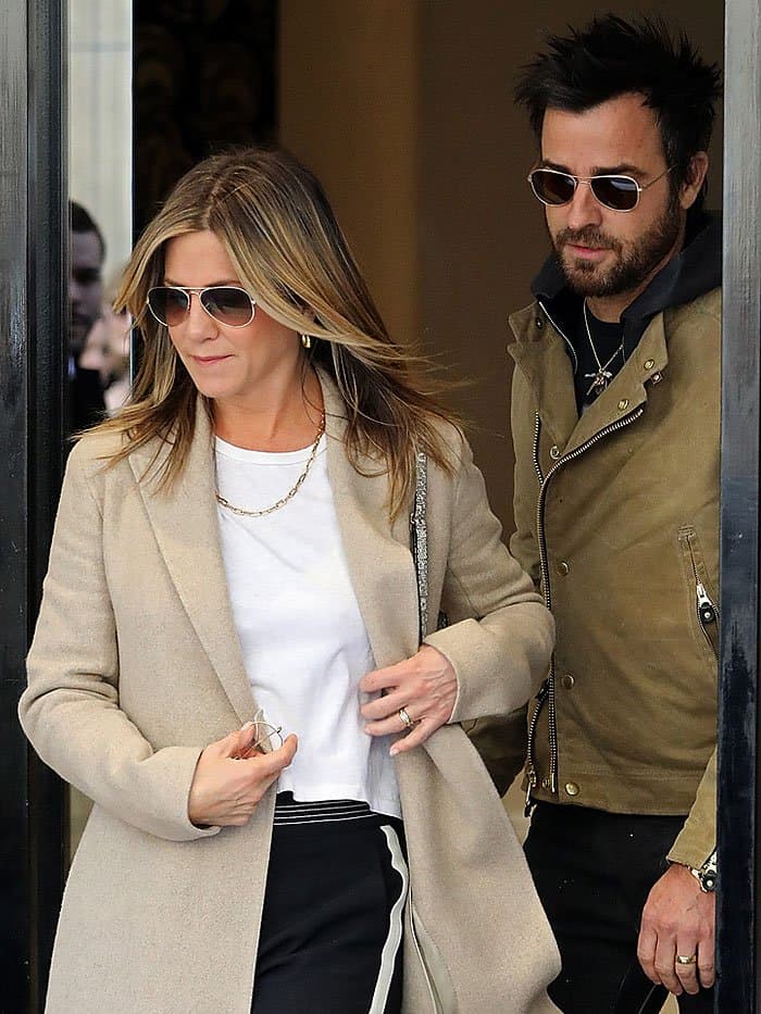 Jennifer Aniston styled her pants with a longer-cut crop top