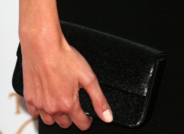 Charlotte Le Bon toting a black clutch