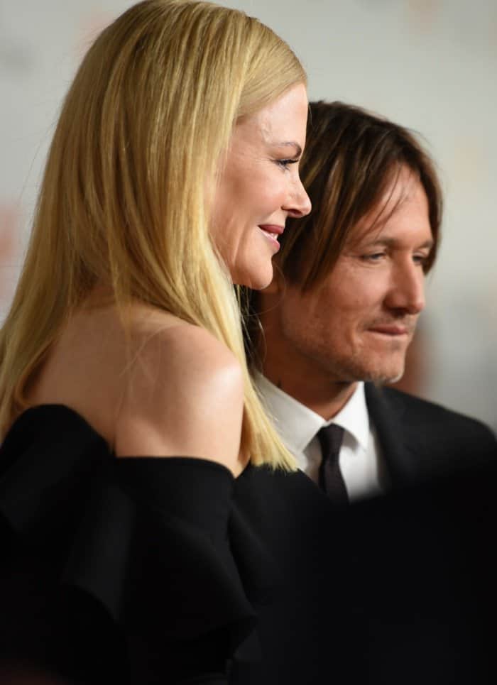 Keith Urban stands next to Nicole Kidman at the premiere of her new movie 'The Upside' on September 8, 2017 in Toronto, Canada