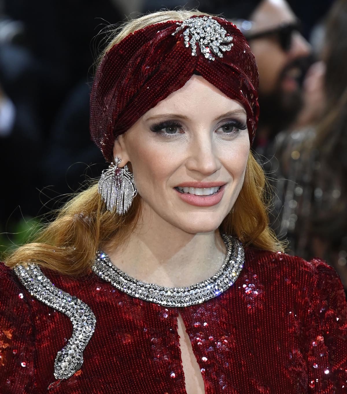 Jessica Chastain wears Gucci High Jewelry earrings in 18kt white gold, pink spinels, and diamonds