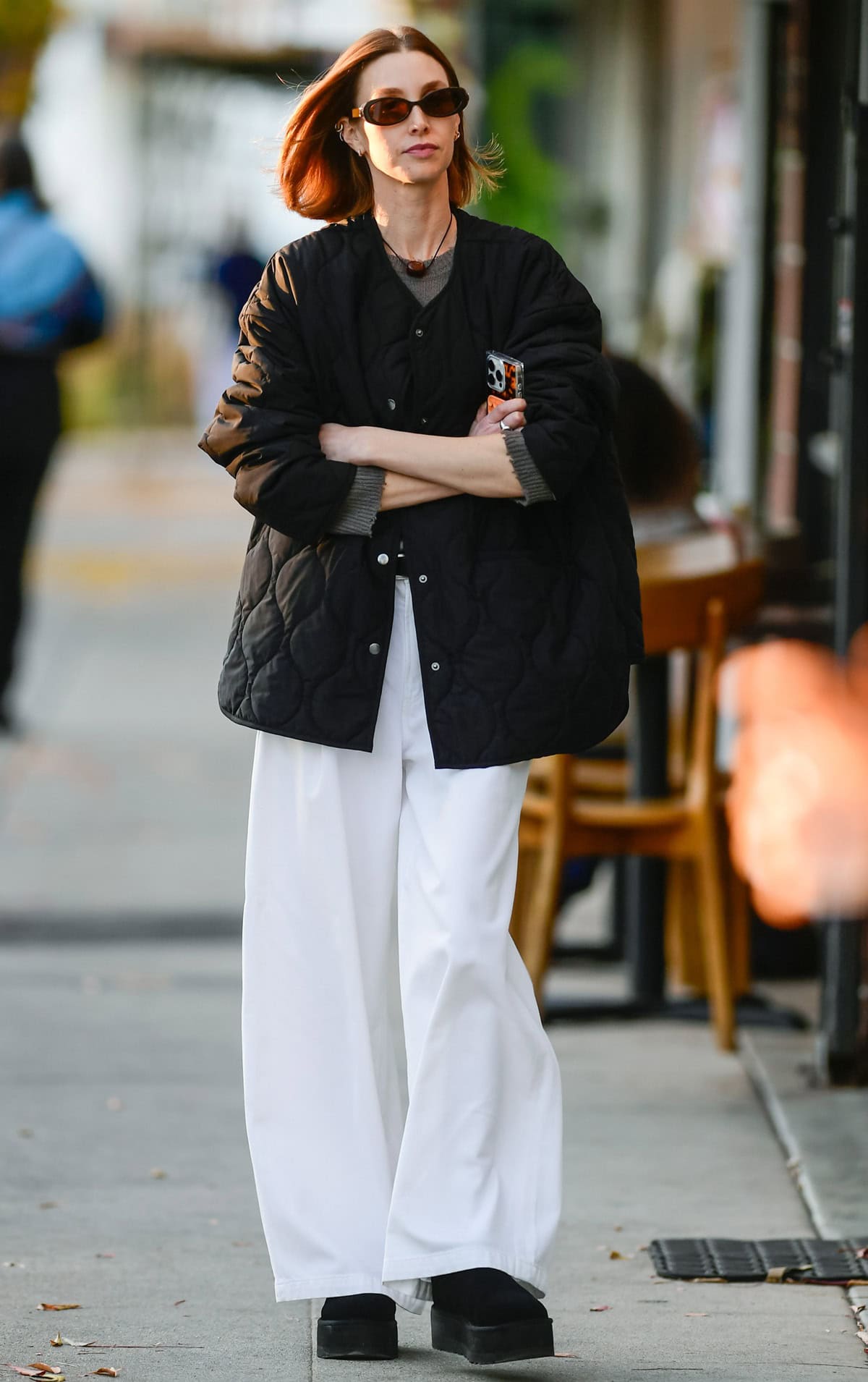 Whitney Port exudes effortless cool in a quilted black jacket, oversized white wide-leg pants, and chunky black platform shoes, adding a modern edge to her laid-back look in Los Angeles on December 19, 2024