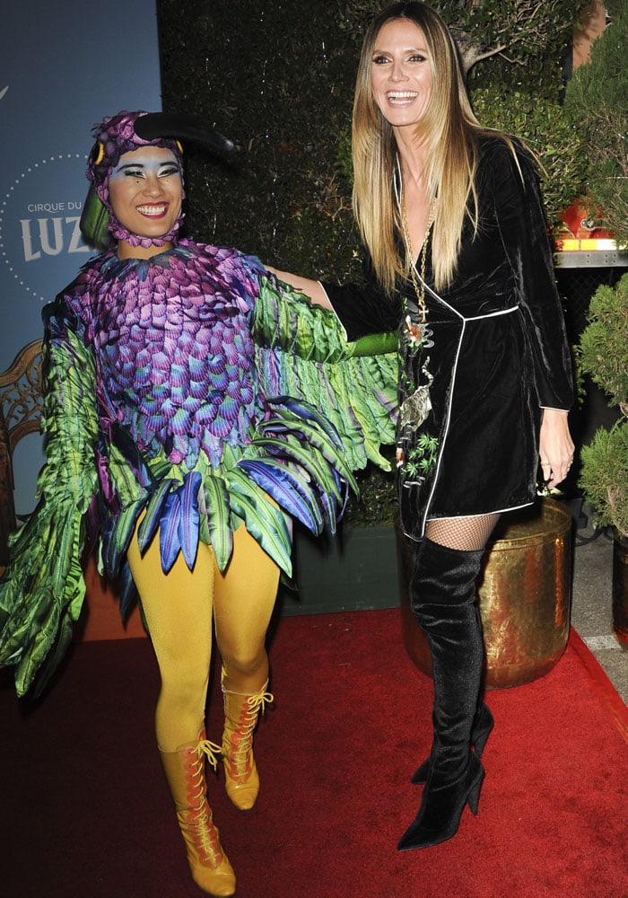 Heidi poses with a character from the Cirque du Soleil show