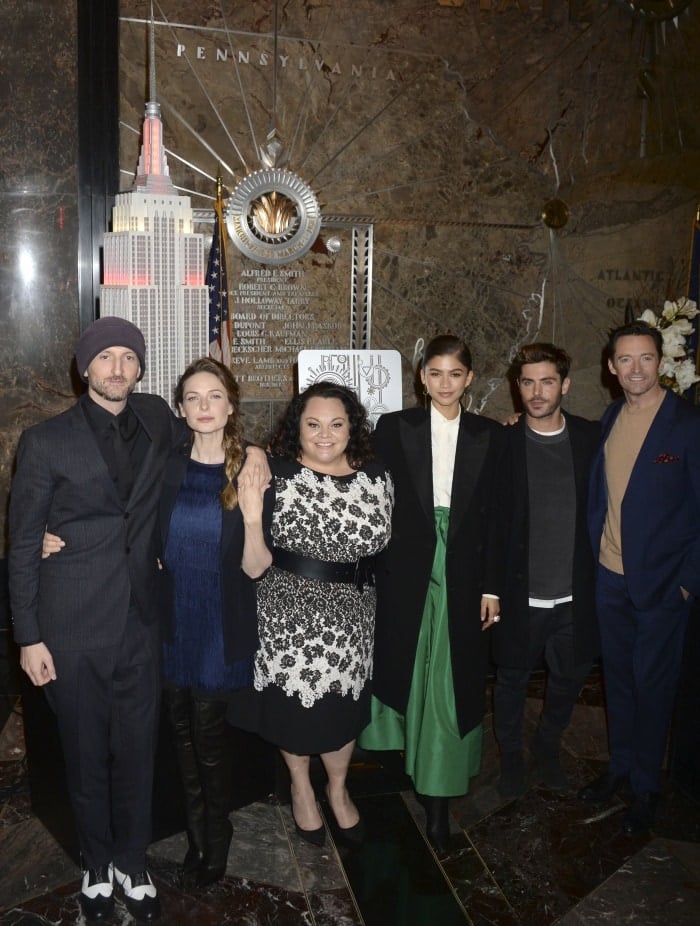 (L-R) Michael Gracey, Rebecca Ferguson, Keala Settle, Zendaya, Zac Efron, and Hugh Jackman attend the cast of "The Greatest Showman" light the Empire State Building