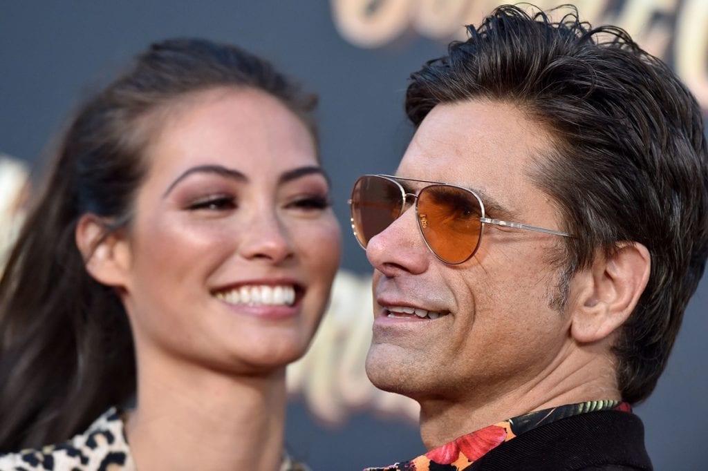 How John Stamos Met His Much Younger Wife Caitlin Mchugh 