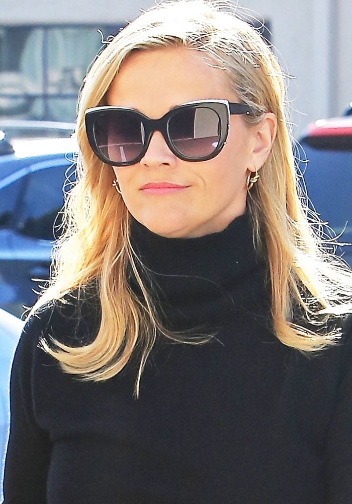Reese Witherspoon Takes Shopping Break in Salvatore Ferragamo Boots