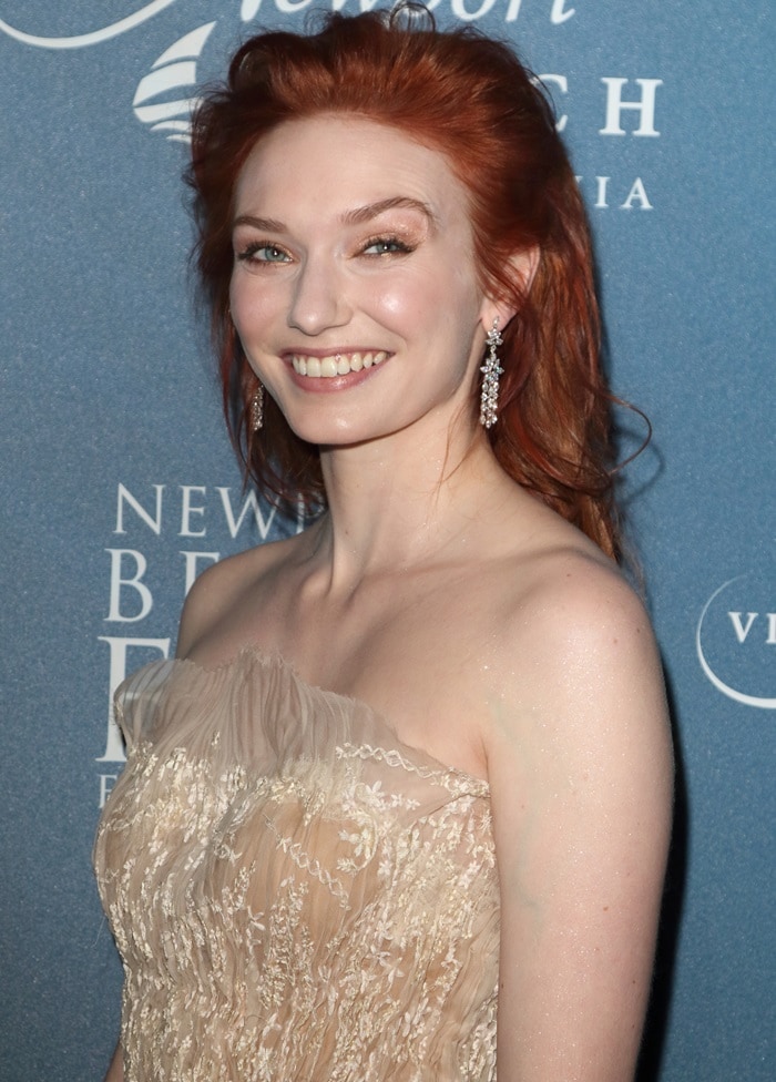 Eleanor Tomlinson's strapless pleated embroidered dress