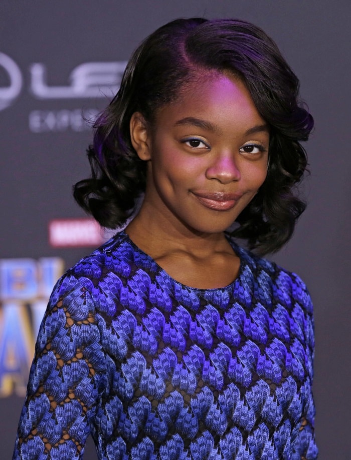 Marsai Martin embraces vintage glamour with soft curls and natural makeup at the premiere of Marvel’s 'Black Panther'