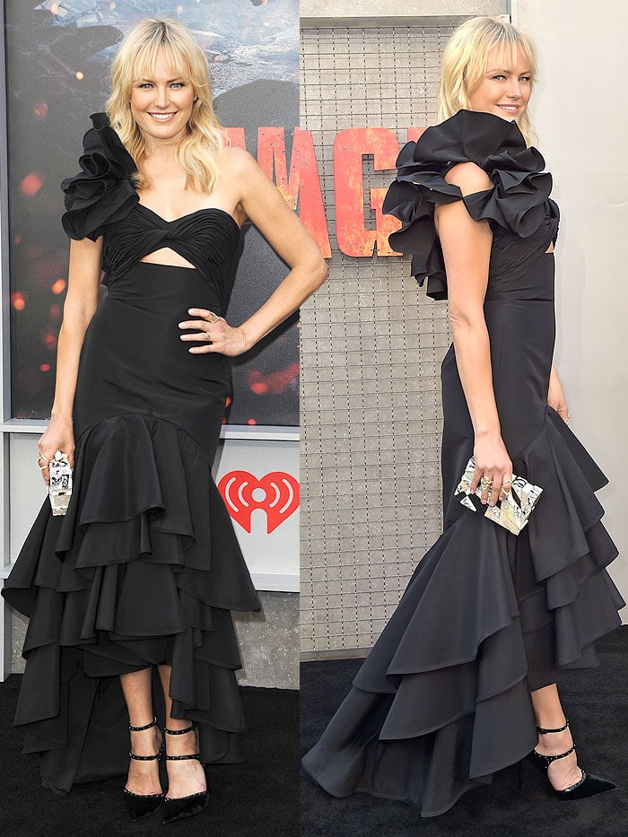 Malin Akerman wearing a Johanna Ortiz black ruffled one-shoulder dress and Le Silla "Borgia" pumps