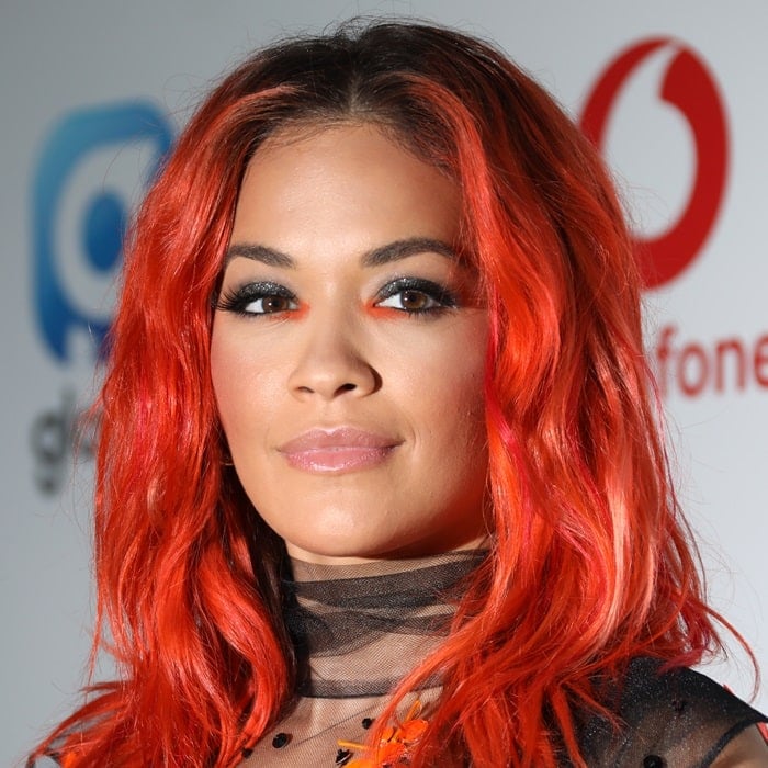 Rita Ora's dyed red locks at the 2018 Capital FM SummerTime Ball at Wembley Stadium in London, England, on June 9, 2018