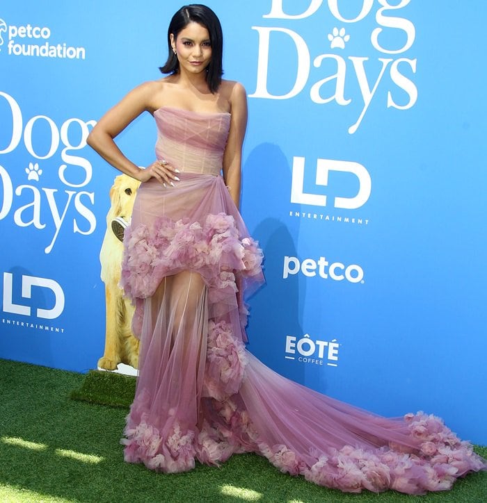 Vanessa Hudgens in a rose-colored Marchesa Spring 2018 gown featuring a strapless neckline and draped tulle and silk organza floral texture