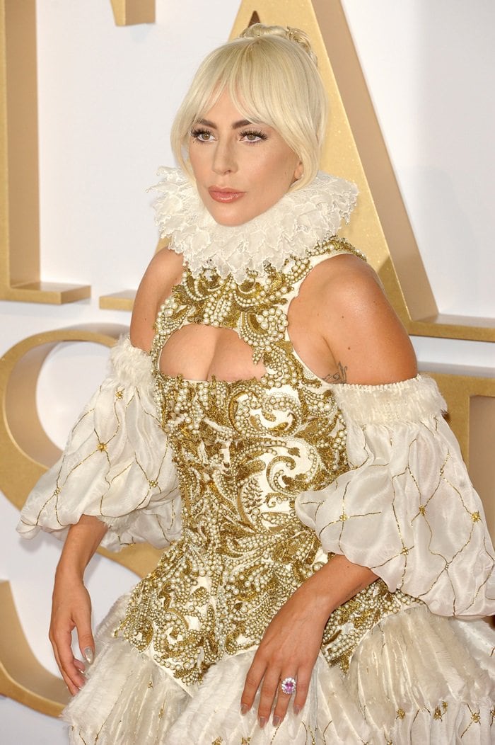 Lady Gaga's dress features an Elizabethan-inspired gold embellished corset-style bodice