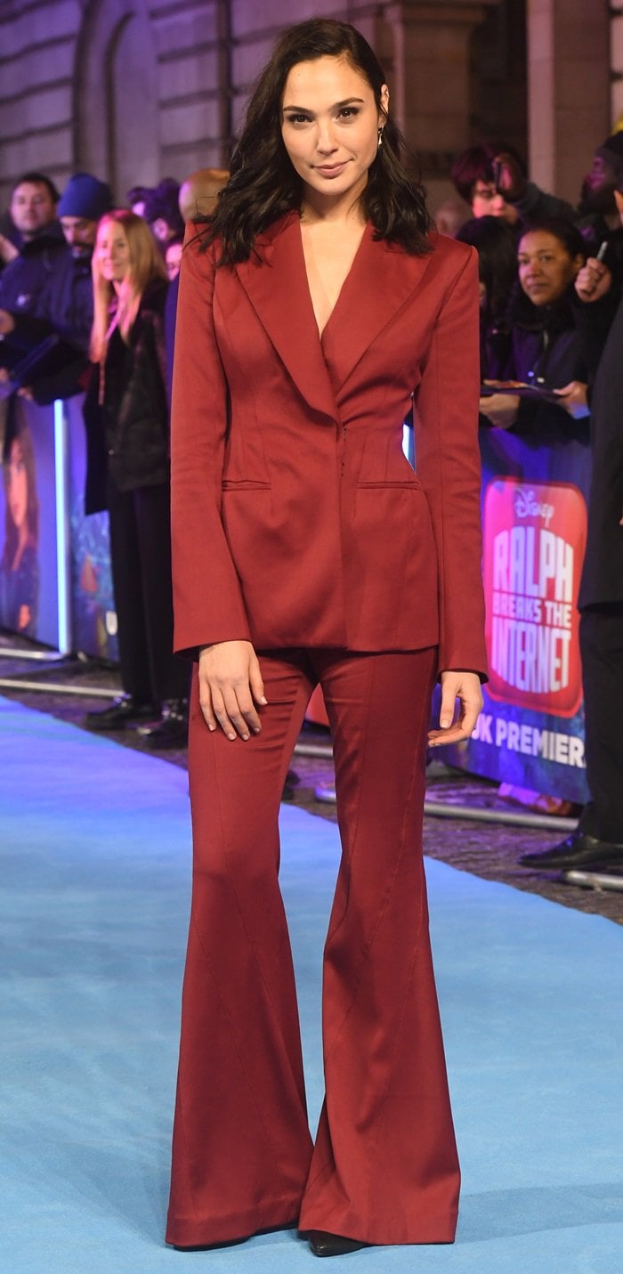 Gal Gadot wore Stuart Weitzman pumps that could not be seen due to the length of her two-piece suit