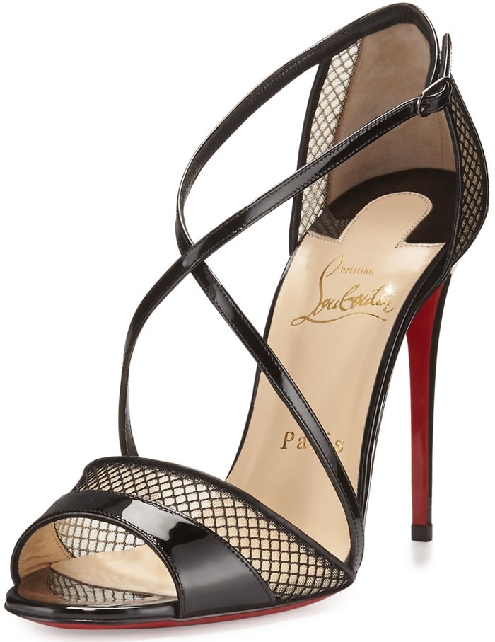 Slender calfskin leather straps interplay with peekaboo mesh on this breathtaking stiletto sandal that expertly showcases the elegant lines of your foot
