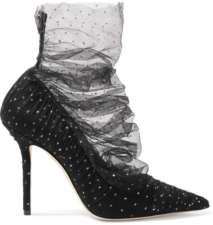 Tiny crystals float all over the slouchy tulle shaft of a celestial bootie set on a striking pointy-toe leather pump