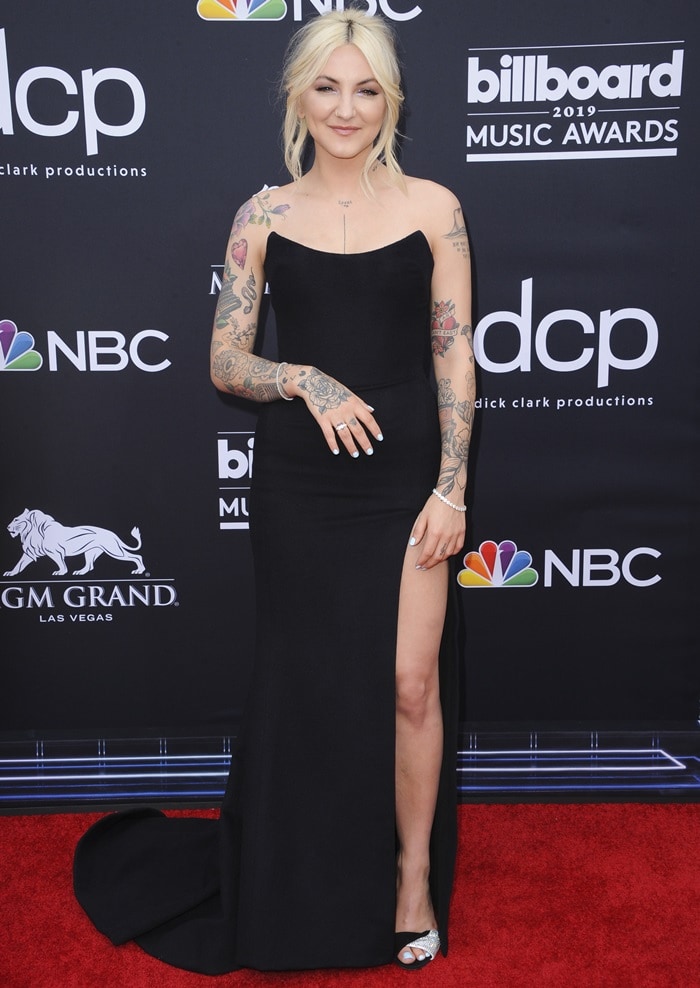 Julia Michaels in crystal-embellished suede slingback sandals by Giuseppe Zanotti