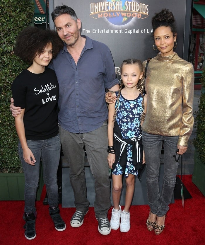 Thandie Newton posed with her husband Ol Parker and their daughters Ripley, 15, and Nico, 11, while attending the Wizarding World of Harry Potter Opening held at Universal Studios Hollywood in Universal City, California, on April 5, 2013