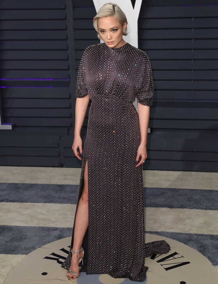 Pom Klementieff flashed her legs in Shiloh sandals at the 2019 Vanity Fair Oscar Party at the Wallis Annenberg Center for the Performing Arts in Beverly Hills, California, on February 24, 2019