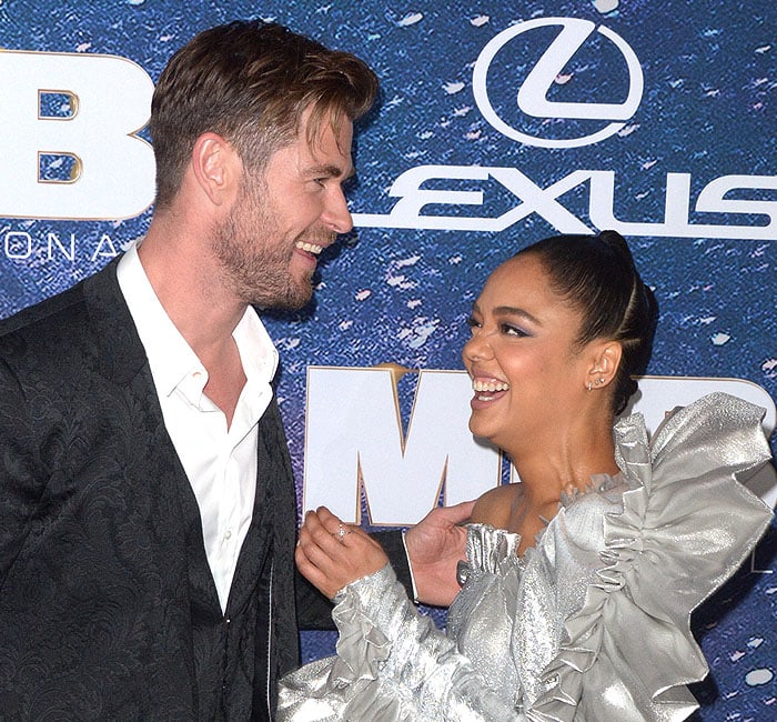 Chris Hemsworth and Tessa Thompson being cute and sharing a laugh