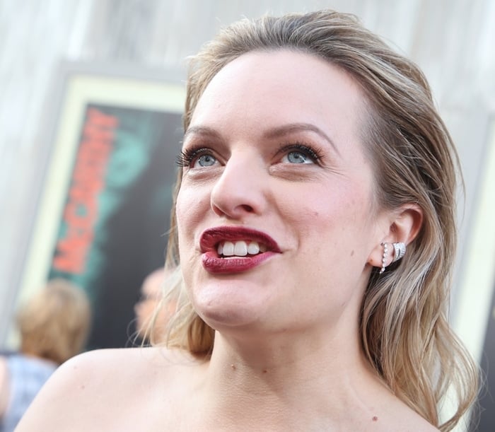 Elisabeth Moss exudes elegance with her dark blonde hair slicked back, attending The Kitchen premiere at TCL Chinese Theatre, Hollywood, August 5, 2019